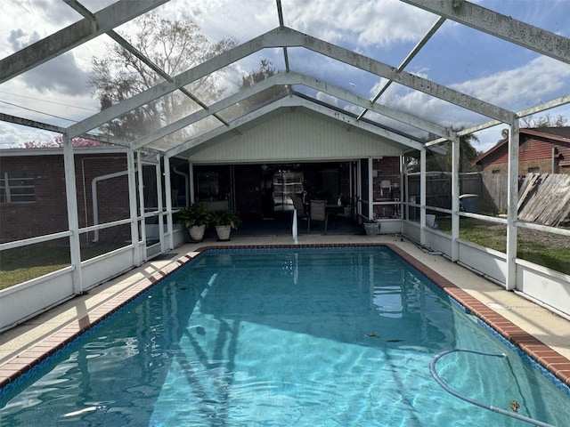 view of pool with a lanai, a patio area, and a fenced in pool