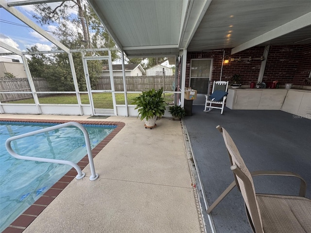 view of pool featuring a fenced in pool, a lanai, a patio area, and fence