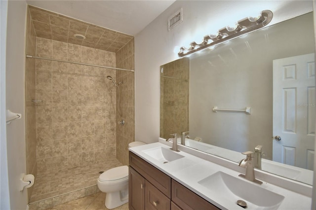 full bathroom with toilet, visible vents, and a sink