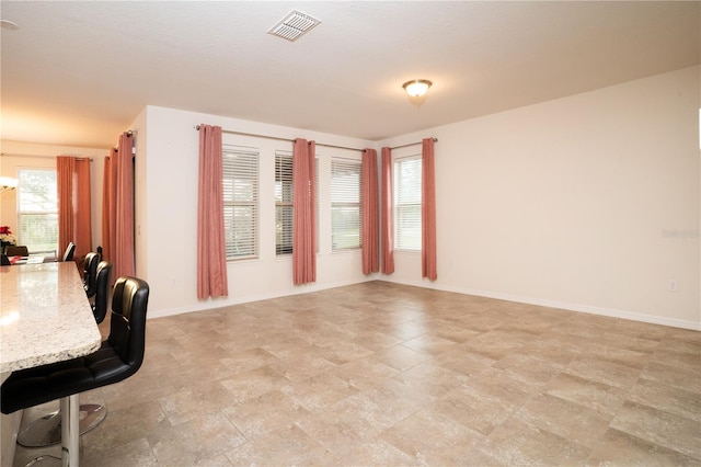 interior space featuring visible vents and baseboards