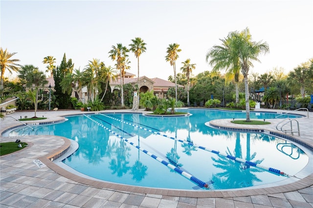community pool featuring a patio area