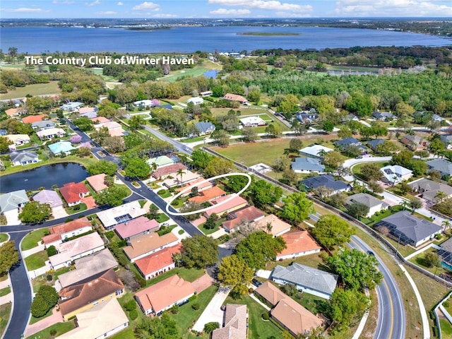 aerial view featuring a residential view and a water view