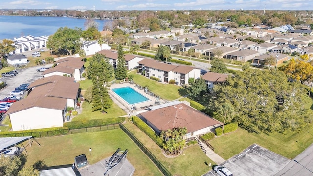 aerial view featuring a residential view and a water view