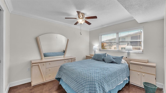 bedroom featuring dark wood-style floors, baseboards, ornamental molding, and a textured ceiling