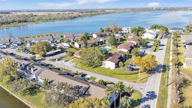 aerial view with a water view and a residential view