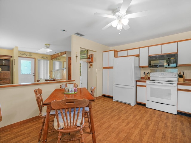 kitchen featuring ceiling fan, white appliances, visible vents, white cabinetry, and light wood-style floors