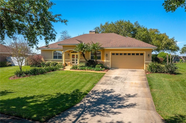 view of front of home featuring stucco siding, driveway, a front yard, an attached garage, and a chimney