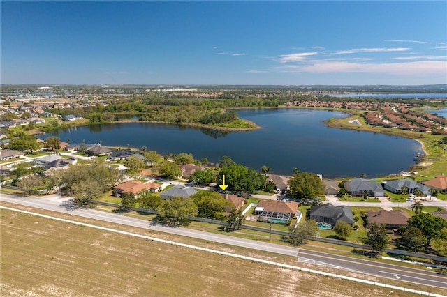 bird's eye view with a water view and a residential view