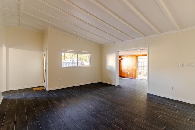 spare room with vaulted ceiling with beams, baseboards, and dark wood finished floors