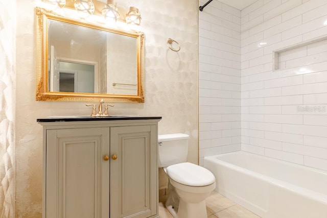 bathroom with washtub / shower combination, vanity, toilet, and tile patterned floors