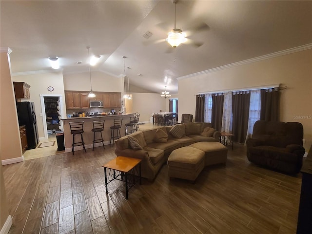 living area featuring dark wood-style floors, crown molding, and ceiling fan with notable chandelier