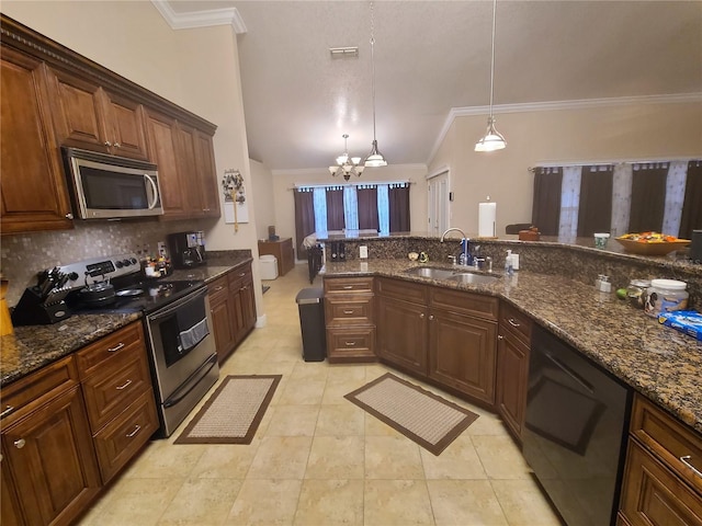 kitchen featuring backsplash, crown molding, a chandelier, stainless steel appliances, and a sink