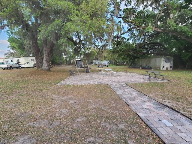 view of yard with a patio area