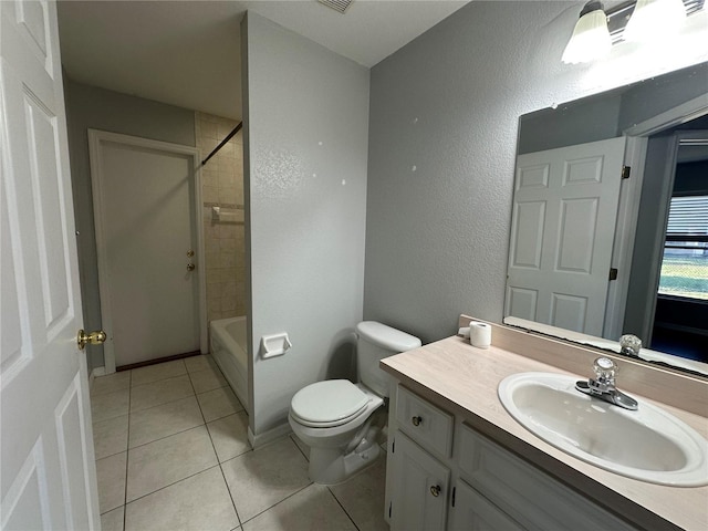 full bathroom with vanity,  shower combination, tile patterned flooring, and toilet