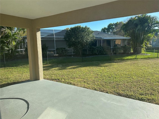 view of yard with fence and a patio