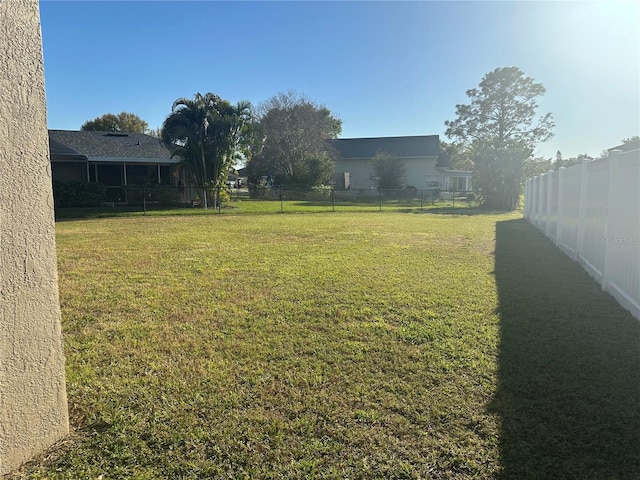 view of yard with fence