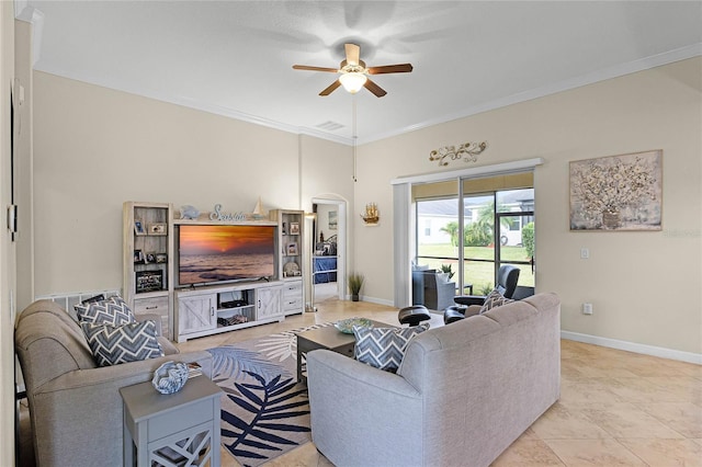 living area featuring crown molding, a ceiling fan, baseboards, and visible vents
