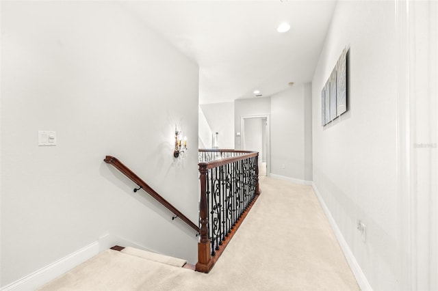 stairs featuring baseboards, carpet flooring, and recessed lighting
