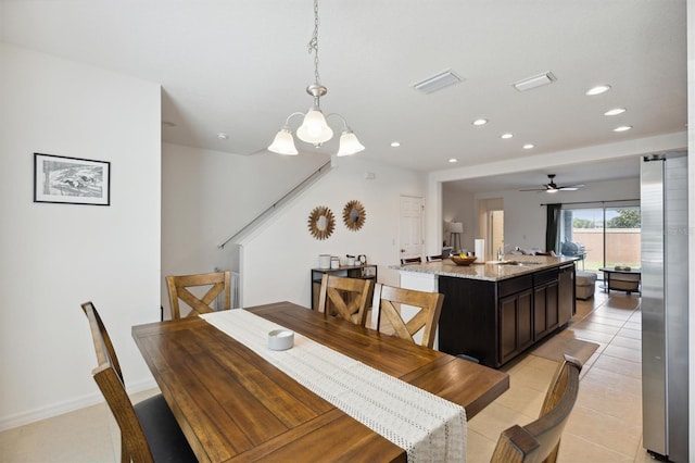 dining room featuring light tile patterned floors, baseboards, visible vents, a notable chandelier, and recessed lighting