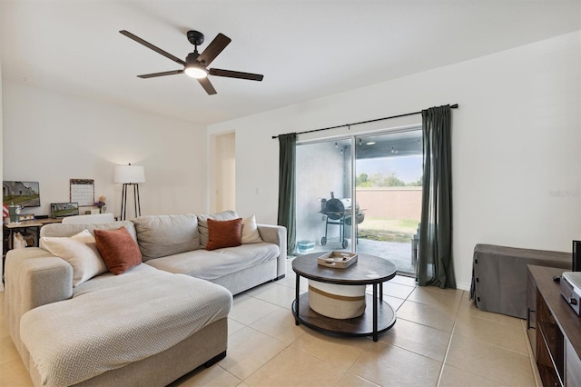 living room with light tile patterned floors and ceiling fan