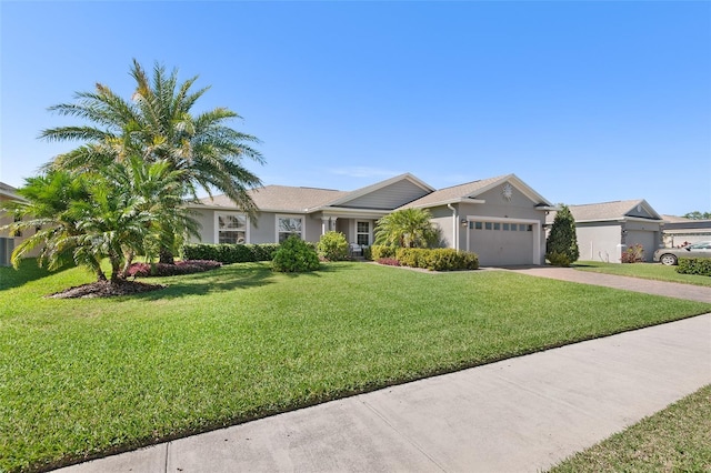 ranch-style home with a garage, driveway, a front lawn, and stucco siding