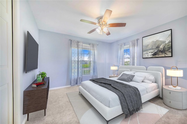 bedroom featuring carpet flooring, ceiling fan, and baseboards