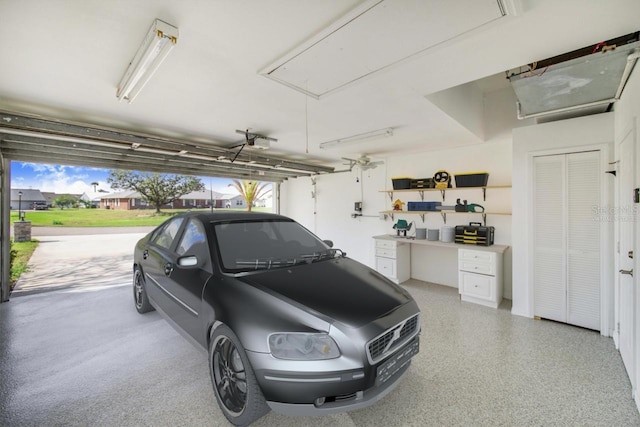 garage featuring a garage door opener