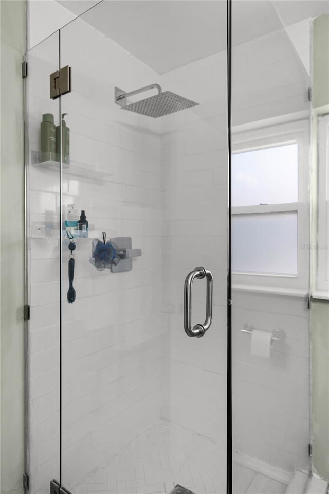 bathroom featuring a stall shower