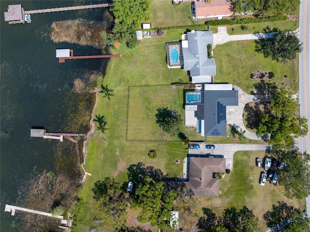 drone / aerial view with a water view