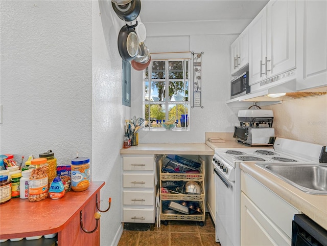 kitchen with under cabinet range hood, stainless steel microwave, white electric range oven, white cabinets, and dishwasher
