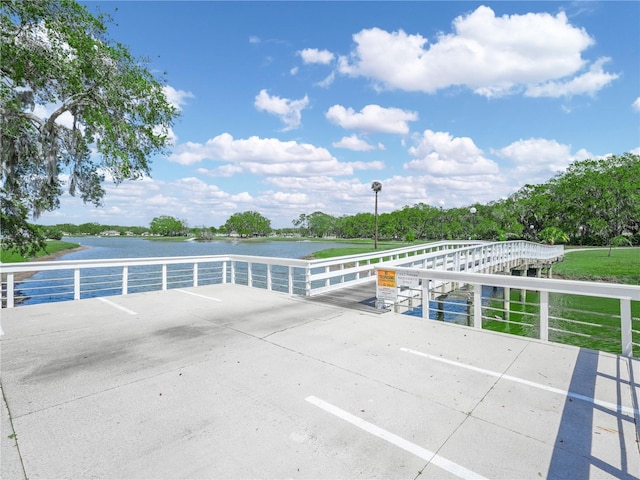 view of patio with a water view