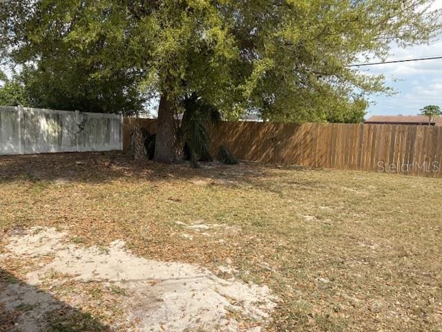 view of yard with fence