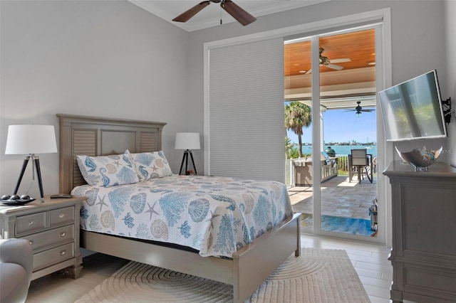 bedroom with access to exterior and a ceiling fan