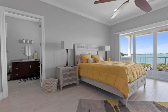 bedroom with ceiling fan, light wood-style floors, a water view, crown molding, and access to outside