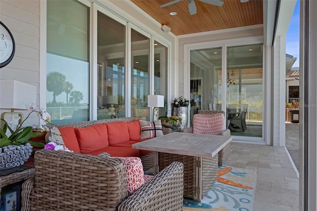 view of patio with an outdoor hangout area and ceiling fan