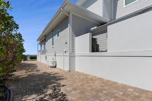 view of property exterior featuring a patio