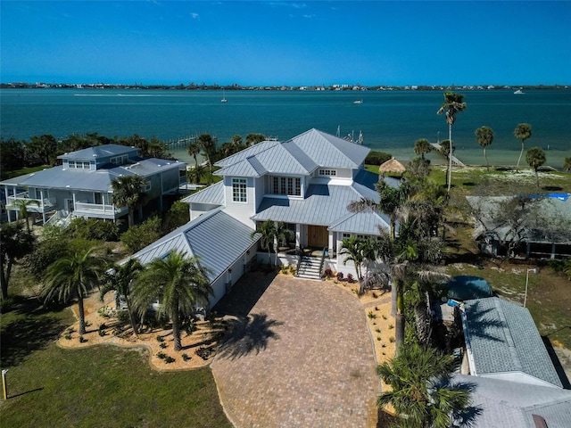 birds eye view of property featuring a water view