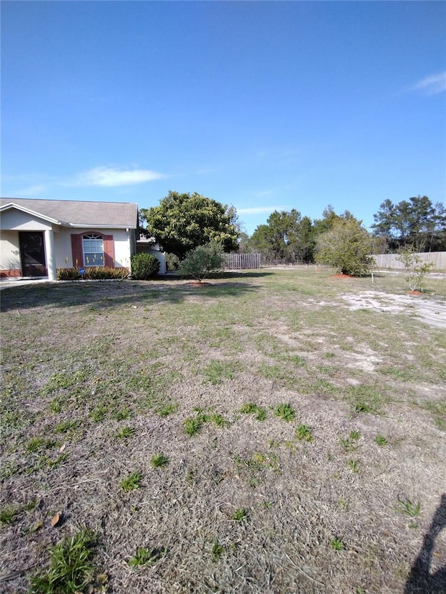 view of yard with fence