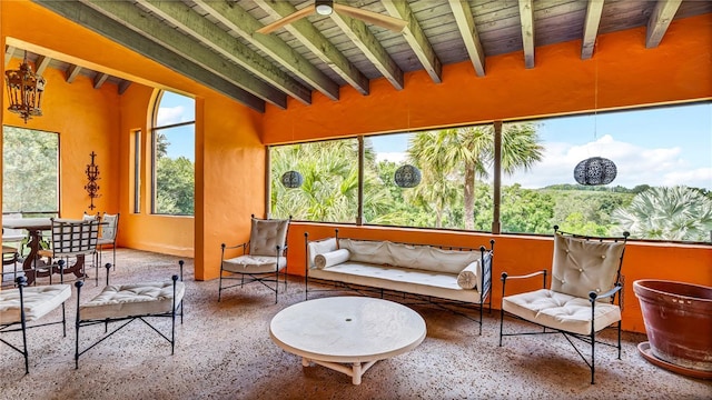 sunroom with beamed ceiling and wood ceiling