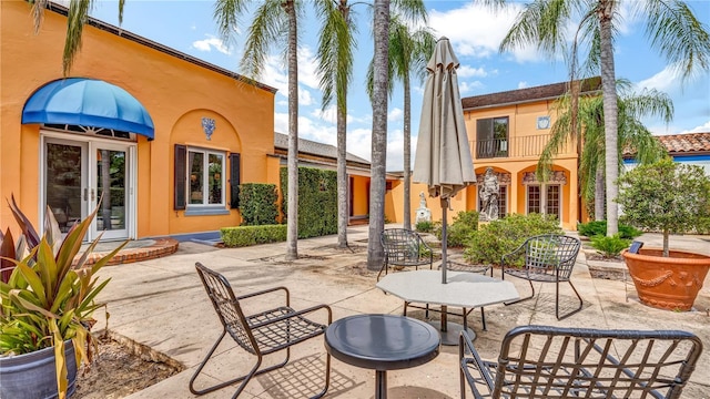 view of patio featuring french doors