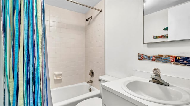 full bath featuring toilet, vanity, and shower / bath combination with curtain