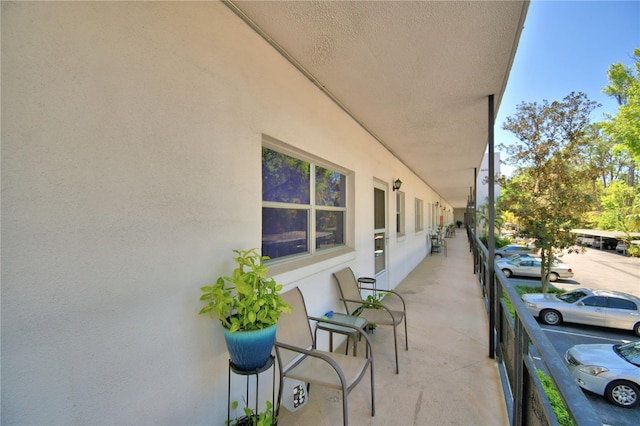 view of patio / terrace with a balcony