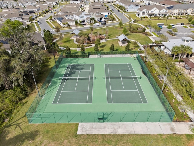 birds eye view of property with a residential view