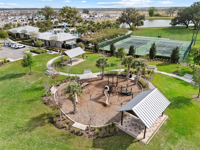 drone / aerial view with a water view