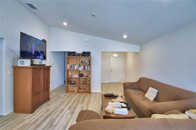 living room featuring visible vents, recessed lighting, light wood-style floors, and lofted ceiling