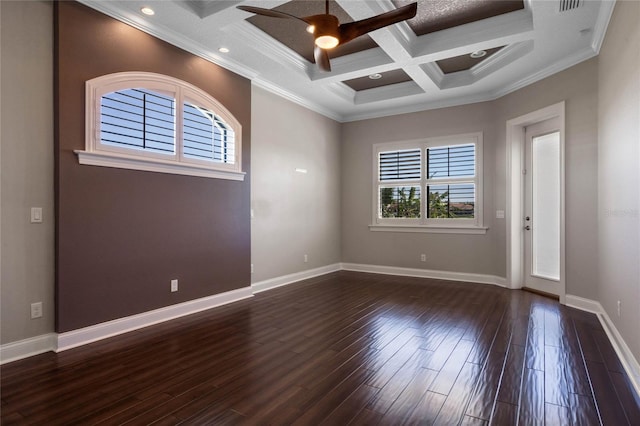 spare room featuring coffered ceiling, dark wood-style floors, crown molding, baseboards, and ceiling fan