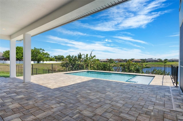 view of swimming pool featuring a fenced in pool, fence, and a patio area