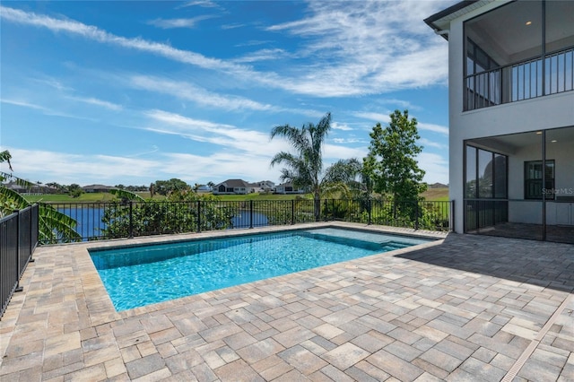 view of swimming pool featuring a fenced in pool, a patio, and fence