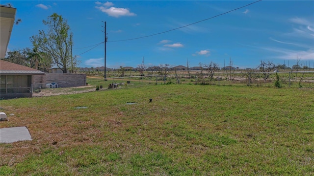 view of yard featuring fence