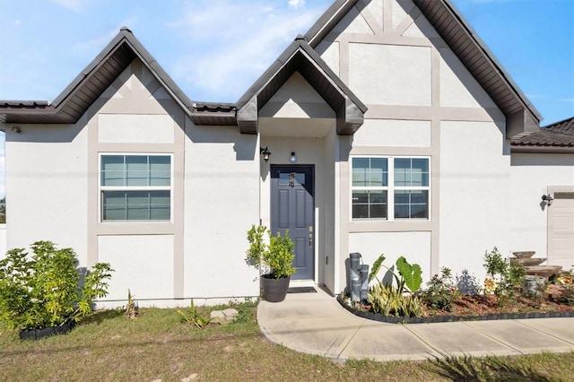 747 Fraser Ct, Kissimmee, FL 34759 - view of front of property featuring a tiled roof and stucco siding